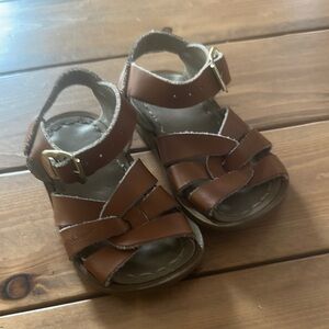 Uses baby Salt Water Sandals size 4